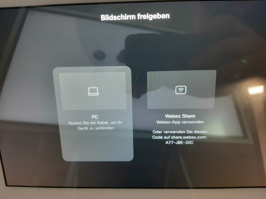 Anzeige auf dem Touchpanel mit einer Anleitung zum Teilen